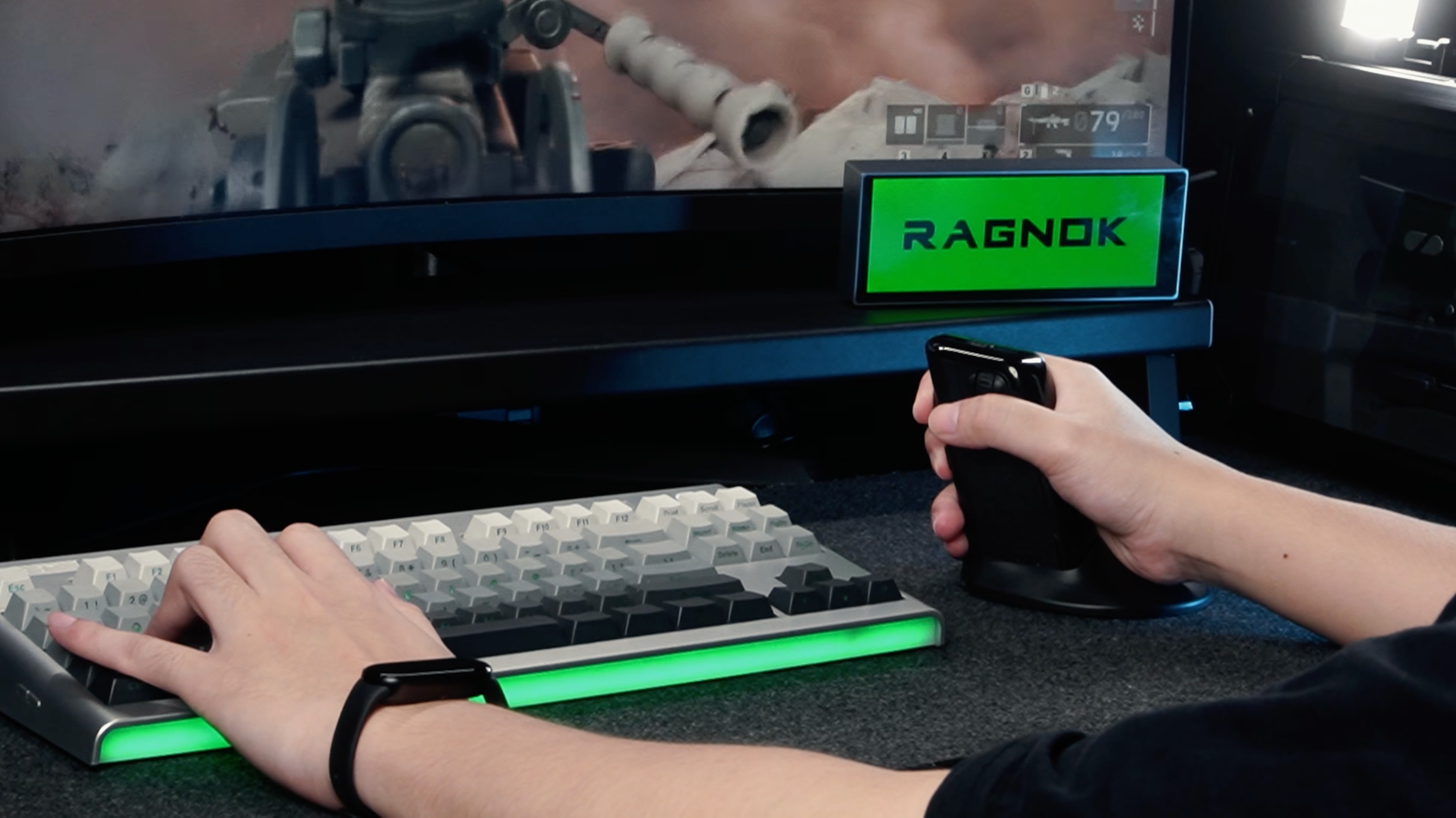 RAGNOK FireGrip gaming mouse shown in gameplay use.